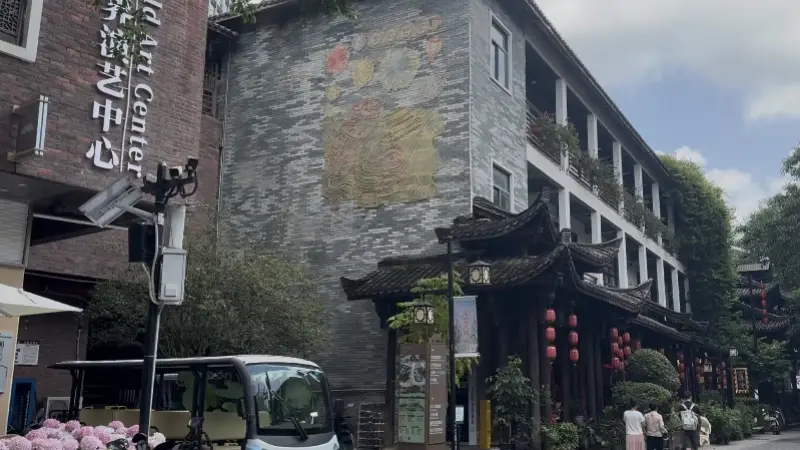 甘坑古镇AI付费涉摄录争议 景区叫停项目撤推广物料