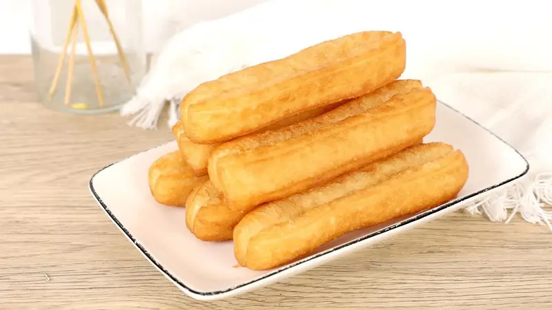 中国人为什么喜欢油条?这一口酥脆,就是早餐的灵魂!